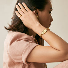 Load image into Gallery viewer, Tanit Bangle - Yellow Gold Plate